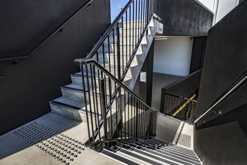 North Lakes Medical | Stainless Steel Tactiles with anchor | Polymeric Tactile Individuals | Acclimite Stair Nosing