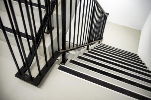 North Lakes Medical | Stainless Steel Tactiles with anchor | Polymeric Tactile Individuals | Acclimite Stair Nosing
